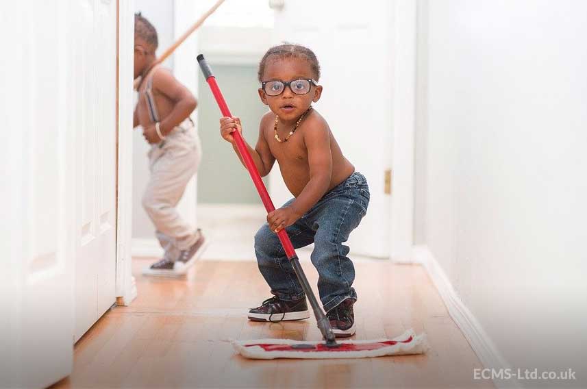 Child Mopping Floor