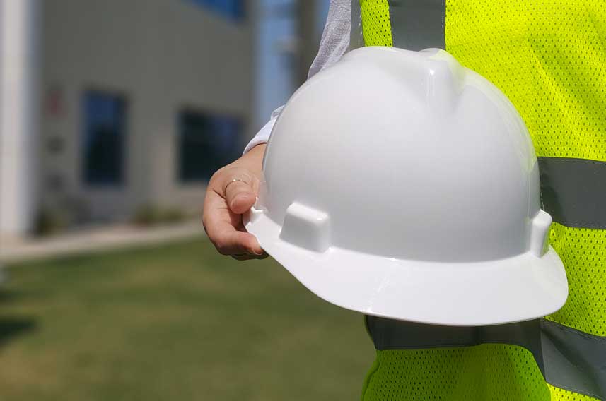 Holding White Hard Hat