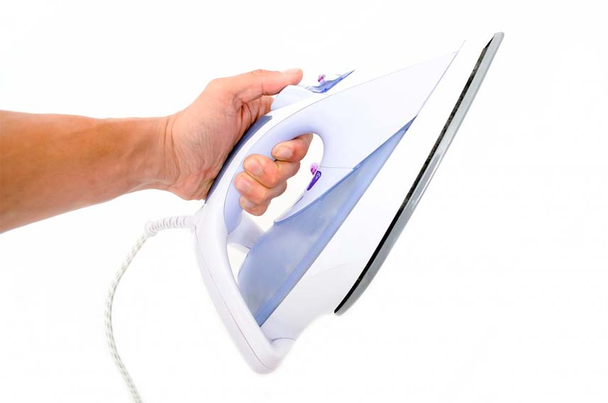 Holding Electric Iron